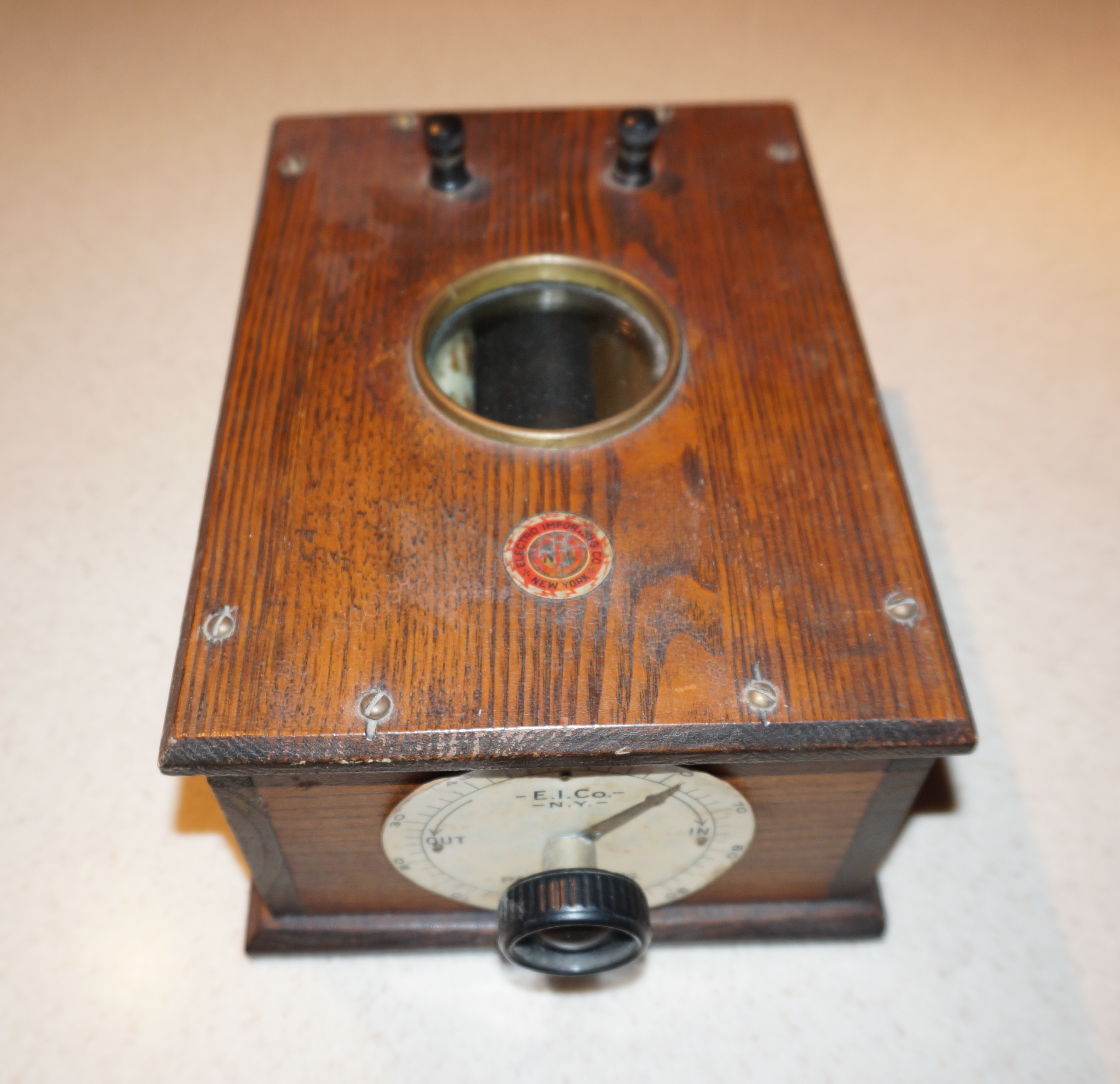 Rotary variable condenser manufactured by the Electro Importing Company.  The inner spherical drum is made of ebonite.  The bottom has several stickers, reading "Property of Harold S. Greenwood, W6MEA" and "Assembler No. 14 Finished this Instrument. Any Defect should be Promptly Reported to Electro Importing Co. 233 Fulton St., N. Y." and a Foreman's Inspection Stamp.  Courtesy, Collection of Jim and Felicia Kreuzer, Grand Island, NY.